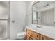 Bathroom features wood vanity and shower at 9805 W Gulf Hills Dr, Sun City, AZ 85351