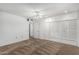 Large bedroom featuring neutral carpet and closet with louvered doors at 9805 W Gulf Hills Dr, Sun City, AZ 85351