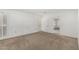 Bedroom features neutral carpet and shuttered windows at 9805 W Gulf Hills Dr, Sun City, AZ 85351