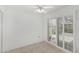 Bright dining area featuring sliding doors to the patio and neutral tile floors at 9805 W Gulf Hills Dr, Sun City, AZ 85351