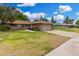 Charming single-story home with well-manicured lawn, desert landscaping, and a two-car garage at 9805 W Gulf Hills Dr, Sun City, AZ 85351