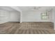 Bright living room with carpet flooring, natural light, and open space for entertaining at 9805 W Gulf Hills Dr, Sun City, AZ 85351