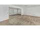 Bright living room features neutral carpet, lots of natural light and ceiling fan at 9805 W Gulf Hills Dr, Sun City, AZ 85351