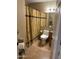 Cozy bathroom with unique curtain design and vanity at 1001 N Pasadena St # 162, Mesa, AZ 85201