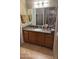 Bathroom vanity features granite counters, a single sink, and ample storage space at 1001 N Pasadena St # 162, Mesa, AZ 85201
