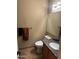 Cozy half bathroom with granite countertop, neutral tones, and decorative towels at 1001 N Pasadena St # 162, Mesa, AZ 85201