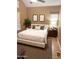 Bright bedroom with natural light, neutral tones, and a cozy atmosphere at 1001 N Pasadena St # 162, Mesa, AZ 85201
