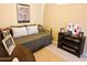 Comfortable bedroom with neutral colors, decorative pillows, and wood accents at 1001 N Pasadena St # 162, Mesa, AZ 85201