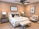 Serene bedroom with a plush bed, soft lighting, and stylish decor at 1001 N Pasadena St # 162, Mesa, AZ 85201