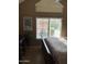 Comfortable bedroom with natural light and furniture at 1001 N Pasadena St # 162, Mesa, AZ 85201