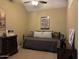 Cozy bedroom features neutral colors, comfortable daybed, and ample natural light at 1001 N Pasadena St # 162, Mesa, AZ 85201