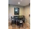 Dining area with seating for four at 1001 N Pasadena St # 162, Mesa, AZ 85201