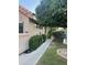Charming patio with lush landscaping and a cozy covered entryway at 1001 N Pasadena St # 162, Mesa, AZ 85201