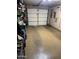 Clean garage with epoxy flooring and ample storage space at 1001 N Pasadena St # 162, Mesa, AZ 85201