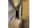 Upper hallway with neutral tones and access to rooms, creating a seamless flow at 1001 N Pasadena St # 162, Mesa, AZ 85201