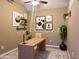 Inviting home office with modern decor, a spacious desk, and natural light at 1001 N Pasadena St # 162, Mesa, AZ 85201