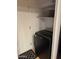 Modern laundry room with washer and shelving at 1001 N Pasadena St # 162, Mesa, AZ 85201