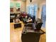 Living room features vaulted ceilings, large windows, and comfortable seating at 1001 N Pasadena St # 162, Mesa, AZ 85201