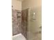 Tiled shower with a built-in niche for toiletries at 1001 N Pasadena St # 162, Mesa, AZ 85201