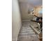 Carpeted staircase leading to the lower level with a neutral color palette at 1001 N Pasadena St # 162, Mesa, AZ 85201