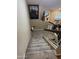 Carpeted stairway leading down features a white and wood railing at 1001 N Pasadena St # 162, Mesa, AZ 85201