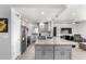 Bright kitchen with granite countertops, stainless steel appliances, and open layout at 1042 E Utopia Rd, Phoenix, AZ 85024