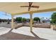 Back porch with decorative brick and a ceiling fan at 1051 S 81St Way, Mesa, AZ 85208