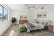 Bright bedroom featuring a comfortable bed, rug, and natural light at 1051 S 81St Way, Mesa, AZ 85208