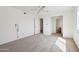 Bright bedroom with neutral carpet, ceiling fan, and ample natural light at 1051 S 81St Way, Mesa, AZ 85208
