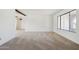 Spacious living room featuring neutral carpet and ample natural light at 1051 S 81St Way, Mesa, AZ 85208