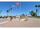 Veterans Memorial featuring flags, landscaping, and the Fountain of the Sun Garden at 1051 S 81St Way, Mesa, AZ 85208