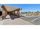 Community pool and sun deck, featuring ample lounge chairs for relaxing in the sun at 1051 S 81St Way, Mesa, AZ 85208