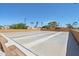 Community shuffleboard court with seating for players and onlookers at 1051 S 81St Way, Mesa, AZ 85208