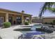 Inviting backyard pool and patio area perfect for outdoor entertaining and desert landscaping at 1123 E Shepherds Way, Casa Grande, AZ 85122