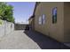 A gravel side yard is perfect for storage next to this house at 1123 E Shepherds Way, Casa Grande, AZ 85122