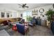 Stylish living room featuring a bar, comfortable seating and unique decorative elements at 1221 E Paseo Way, Phoenix, AZ 85042
