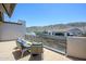 Balcony with lounge seating and view of the desert mountains at 1221 E Paseo Way, Phoenix, AZ 85042
