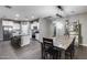 Kitchen with granite countertop island, stainless steel appliances, and eat-in dining at 13657 W Paso Trl, Peoria, AZ 85383
