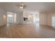 Open-concept living room showcasing luxury vinyl flooring, an open layout, and modern design at 14771 W Columbus Ave, Goodyear, AZ 85395