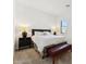 Cozy main bedroom featuring a bed, side tables with lamps, and a window at 16417 W Fawn Dr, Goodyear, AZ 85338