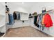 Spacious walk-in closet with ample hanging space and shelving, ideal for organization at 16417 W Fawn Dr, Goodyear, AZ 85338
