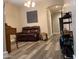 Comfortable living room features a plush leather sofa and neutral decor, creating a cozy and inviting space at 17344 W Adams St, Goodyear, AZ 85338