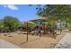 Community playground with slides, swings, and a shade canopy for outdoor fun at 17344 W Adams St, Goodyear, AZ 85338
