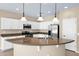 Well-equipped kitchen featuring granite countertops, stainless steel appliances, and ample white cabinetry at 1768 E Grand Ridge Rd, Queen Creek, AZ 85140