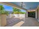The spacious covered patio features beautiful tile flooring and recessed lighting, perfect for outdoor enjoyment at 1768 E Grand Ridge Rd, Queen Creek, AZ 85140