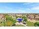 Neighborhood aerial view showcasing community park and playground in a vibrant residential area at 19009 E Reins Rd, Queen Creek, AZ 85142