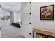 Light-filled bedroom with carpet, closet and doorway at 19009 E Reins Rd, Queen Creek, AZ 85142