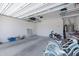 Spacious garage with ample storage and room for bicycles and other gear at 19009 E Reins Rd, Queen Creek, AZ 85142