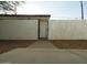 A white gate at backyard entrance providing privacy and security at 1922 N 21St Pl, Phoenix, AZ 85006