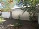 The backyard includes desert landscaping and white fencing around the perimeter at 1922 N 21St Pl, Phoenix, AZ 85006